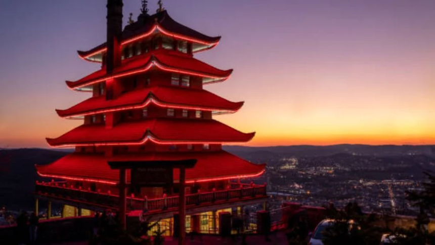 Red pagoda at sunset skyline